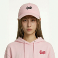 A female model wearing the Smith's 1906 UCP02 Pink Cap is showing the front.