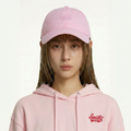A female model wearing the Smith's 1906 UCP02 Pink Cap is showing the front.