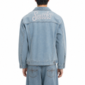 A male model wearing the Smith's 1906 MJK01 Light Blue Denim Jacket is showing the back.