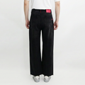 A male model wearing the Smith's 1906 MJN01 Black Jeans is showing the back.