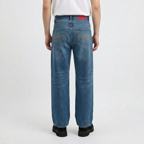 A male model wearing the Smith's 1906 MJN03 Blue Jeans is showing the back.