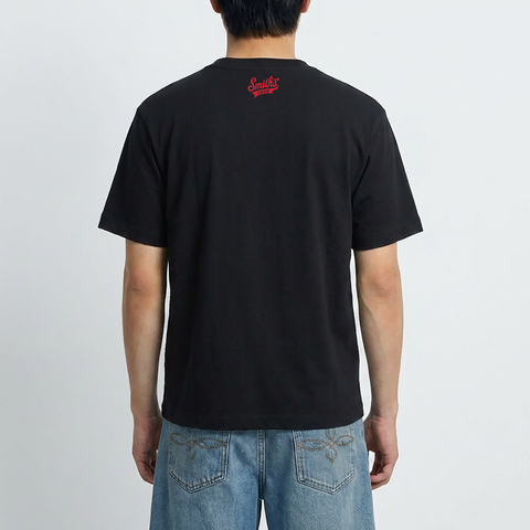 A male model wearing the Smith's 1906 MTE05A Black T-Shirt with New York Graphic is showing the back.