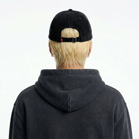 A male model wearing the Smith's 1906 UCP01 Black Cap is showing the back.