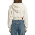 A female model wearing the Smith's 1906 WHO01 Beige Hoodie is showing the back.