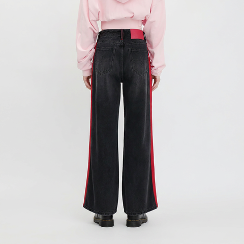A female model wearing the Smith's 1906 WJN02 Dark Grey Jeans is showing the back.