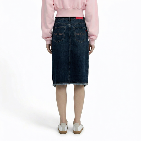 A female model wearing the Smith's 1906 WSK01 Navy Denim Skirt is showing the back.