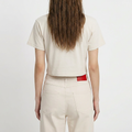 A female model wearing the Smith's 1906 WTE01 Beige T-shirt is showing the back.