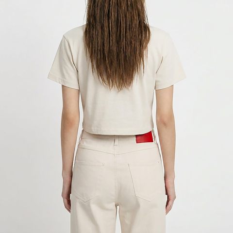 A female model wearing the Smith's 1906 WTE01 Beige T-shirt is showing the back.