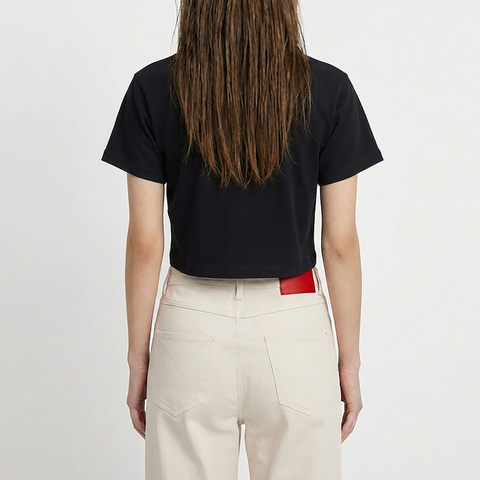 A female model wearing the Smith's 1906 WTE01 Black T-shirt is showing the back.
