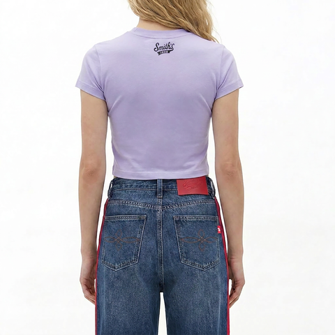 A female model wearing the Smith's 1906 WTE04 Lilac T-Shirt is showing the back.