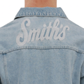 A close-up back view of a male model wearing the Smith's 1906 MJK01 Light Blue Denim Jacket.