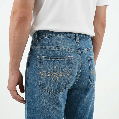 A close-up back view of a male model wearing the Smith's 1906 MJN03 Blue Jeans.