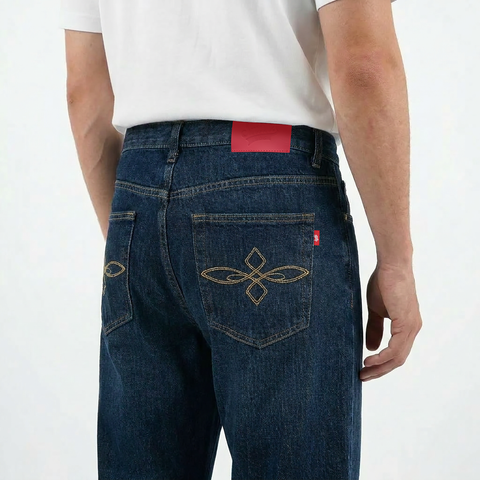 A close-up back view of a male model wearing the Smith's 1906 MJN03 Navy Jeans.