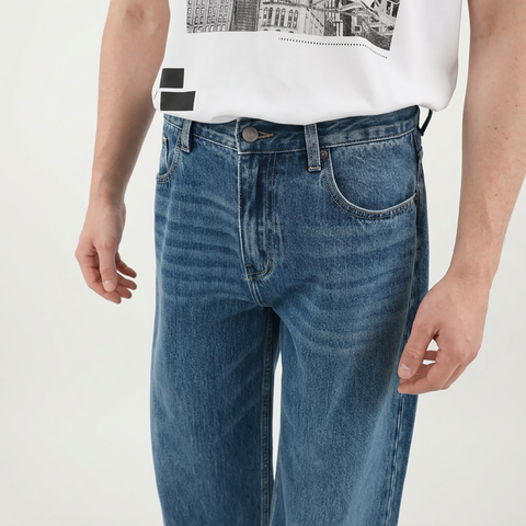 A close-up view of a male model wearing the Smith's 1906 MJN03 Blue Jeans.
