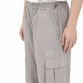 A close-up view of a male model wearing the Smith's 1906 MPT02 Light Grey Pants.