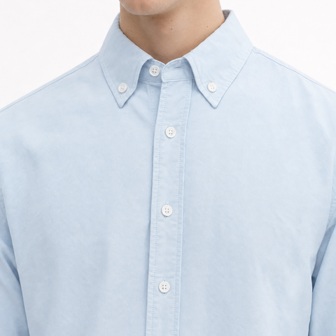 A close-up view of a male model wearing the Smith's 1906 MSR02 Light Blue Shirt.