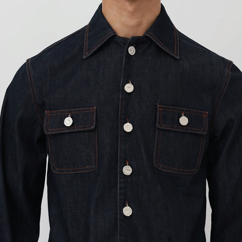 A close-up view of a male model wearing the Smith's 1906 MSR03 Navy Denim Shirt.