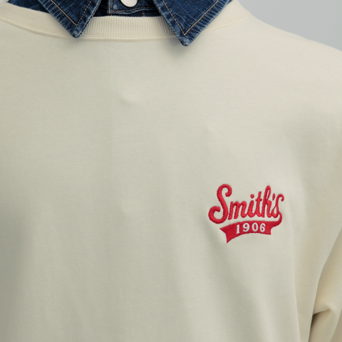 A close-up view of a male model wearing the Smith's 1906 MSW02 Beige Sweatshirt.