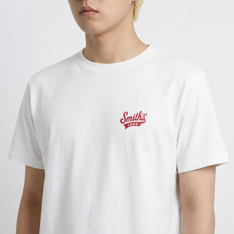 A close-up view of a male model wearing the Smith's 1906 MTE01 White T-Shirt.