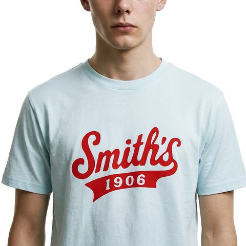 A close-up view of a male model wearing the Smith's 1906 MTE02 Blue T-Shirt.