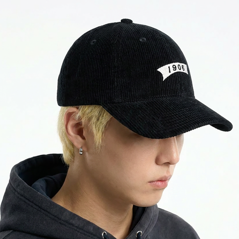 A close-up view of a male model wearing the Smith's 1906 UCP01 Black Cap.