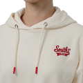 A close-up view of a female model wearing the Smith's 1906 WHO01 Beige Hoodie.
