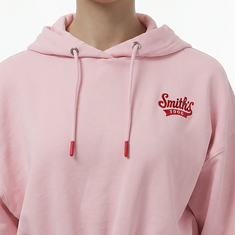 A close-up view of a female model wearing the Smith's 1906 WHO01 Pink Hoodie.