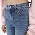 A close-up view of a female model wearing the Smith's 1906 WJN01 Light Blue Jeans.