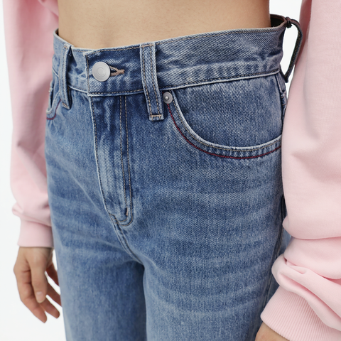 A close-up view of a female model wearing the Smith's 1906 WJN01 Light Blue Jeans.