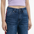 A close-up view of a female model wearing the Smith's 1906 WJN02 Blue Jeans.