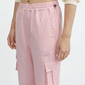 A close-up view of a female model wearing the Smith's 1906 WPT01 Pink Pants.