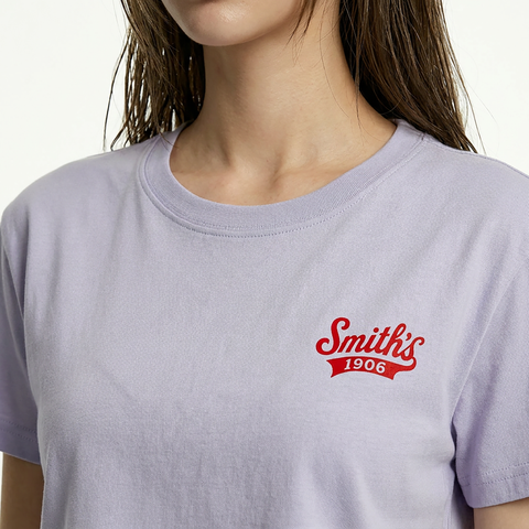 A close-up view of a female model wearing the Smith's 1906 WTE01 Lilac T-shirt.