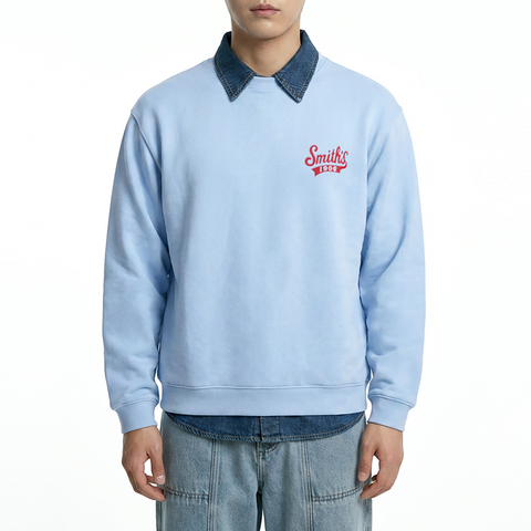 A male model wearing the Smith's 1906 MSW02 Light Blue Sweatshirt is showing the front.