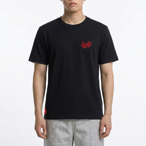 A male model wearing the Smith's 1906 MTE01 Black T-Shirt is showing the front.