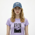 A female model wearing the Smith's 1906 UCP04 Blue Cap is showing the front.