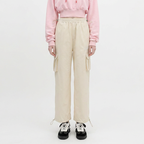 A female model wearing the Smith's 1906 WPT01 Beige Pants is showing the front.