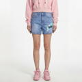A female model wearing the Smith's 1906 WSO01 Light Blue Denim Shorts is showing the front.