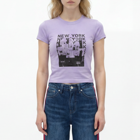 A female model wearing the Smith's 1906 WTE04 Lilac T-Shirt is showing the front.