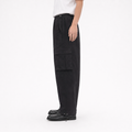 A male model wearing the Smith's 1906 MPT02 Black Pants is showing the side view.