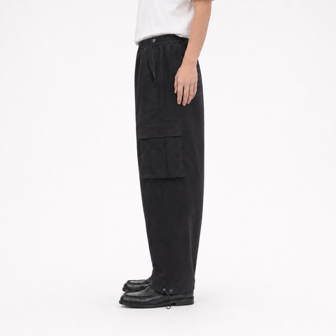 A male model wearing the Smith's 1906 MPT02 Black Pants is showing the side view.