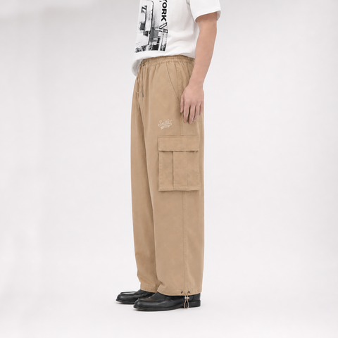 A male model wearing the Smith's 1906 MPT02 Khaki Pants is showing the side view.