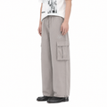 A male model wearing the Smith's 1906 MPT02 Light Grey Pants is showing the side view.