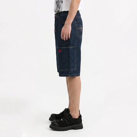 A male model wearing the Smith's 1906 MSO01 Navy Denim Shorts is showing the side view.