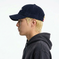 A male model wearing the Smith's 1906 UCP01 Navy Cap is showing the side view.