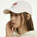 A female model wearing the Smith's 1906 UCP02 White Cap is showing the side view.