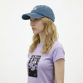 A female model wearing the Smith's 1906 UCP04 Blue Cap is showing the side view.