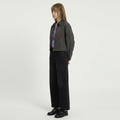 A female model wearing the Smith's 1906 WJK01 Dark Grey Jacket is showing the side view.