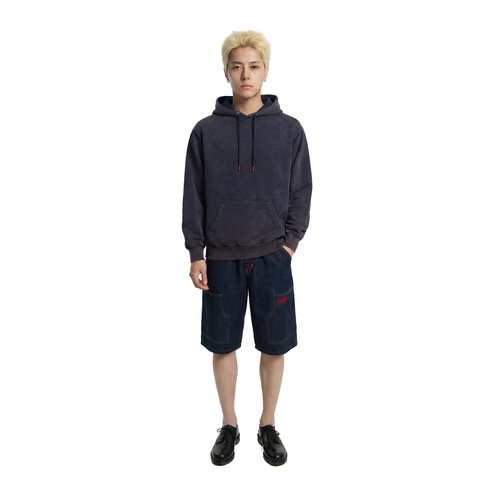 A male model is wearing shorts paired with the Smith's 1906 MHO01 Navy Hoodie.