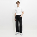 A male model is wearing a polo shirt paired with the Smith's 1906 MJN01 Black Jeans.