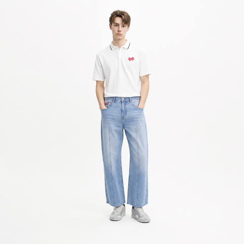 A male model is wearing a polo shirt paired with the Smith's 1906 MJN01 Blue Jeans.